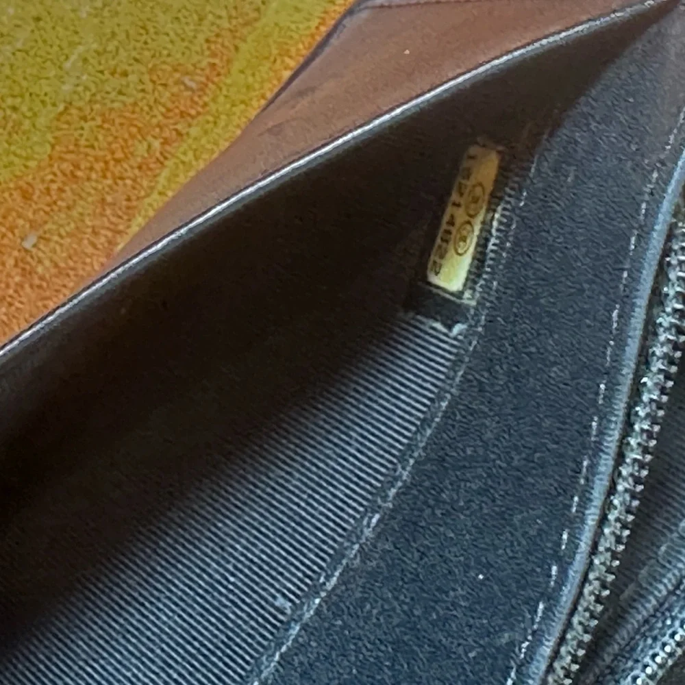 CHANEL Patent Quilted Zip Around Black Wallet